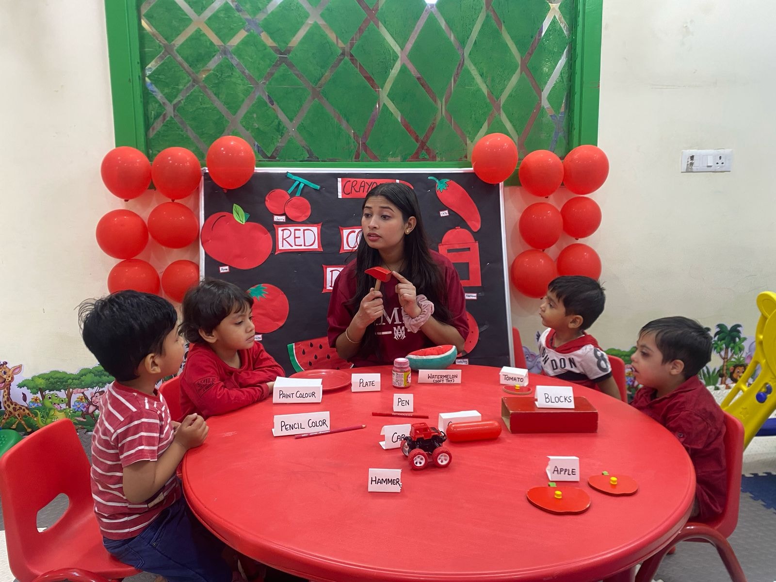 Child engaged in a Montessori activity at Tiny Brainiacs